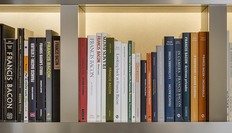 Books from Bacons Library on shelves