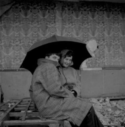 Guy Bourdin, untitled (Guy and Solange with umbrella), c. 1950-60. Negative found in Bourdin’s archives, scanned full-frame. © The Guy Bourdin Estate 2016 / Courtesy of Louise Alexander Gallery